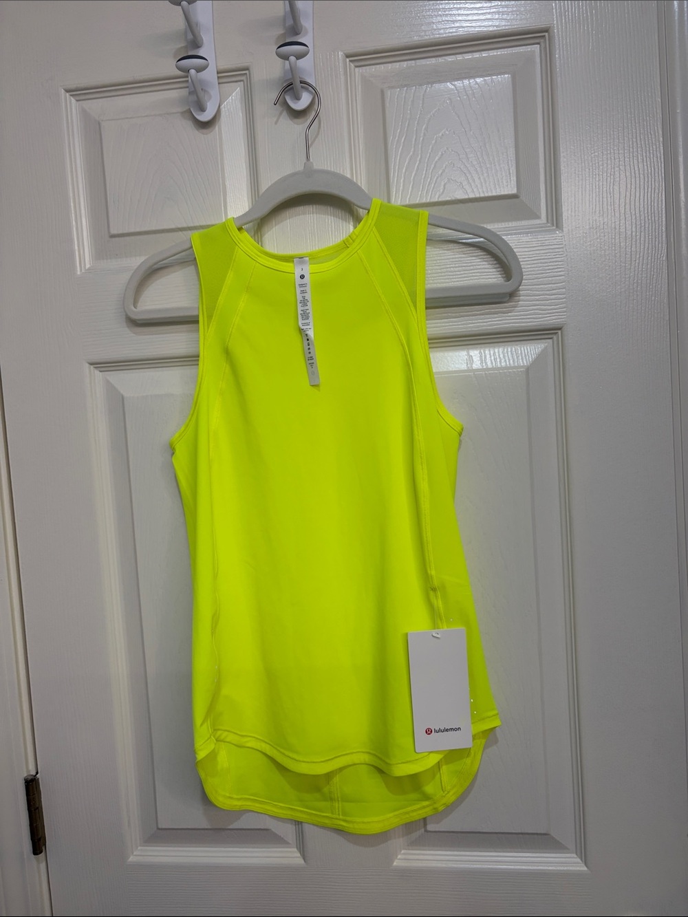 300. Lululemon sculpt tank top highlighter yellow size 2 NWT